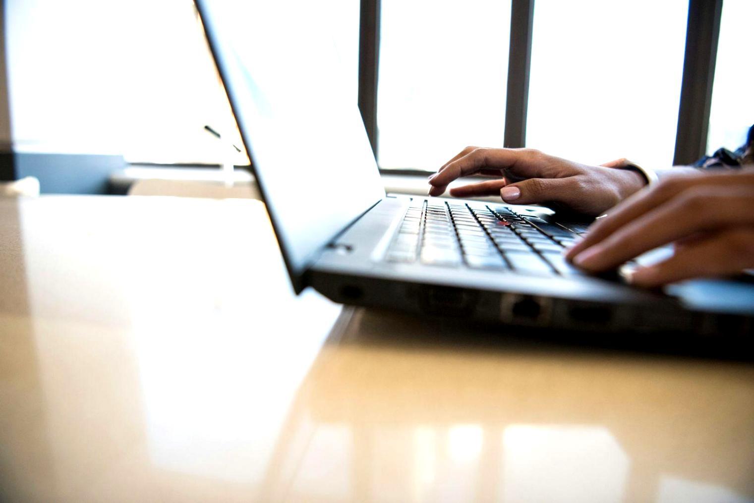 Students working together on API testing challenges in modern learning environment